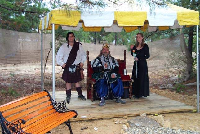 Royal party on their new stage - well at least it isn't sand!