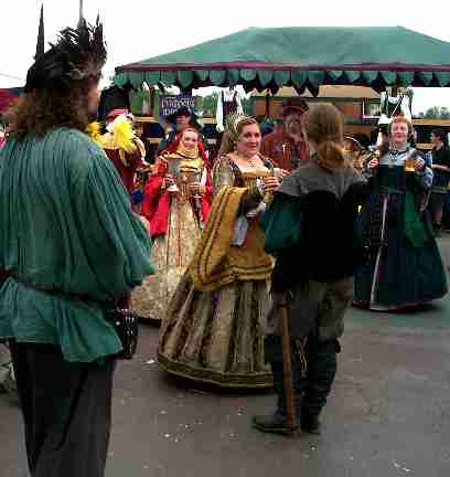 Each of the Rogues presents a rose