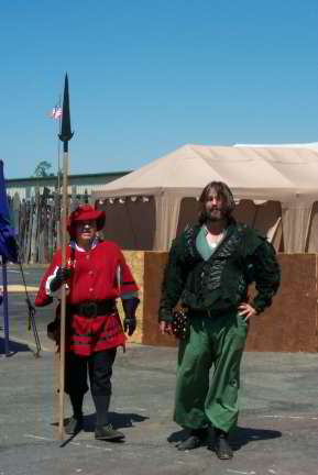 Greg - of Dark Rose Creations - captured by the Queen's Guard