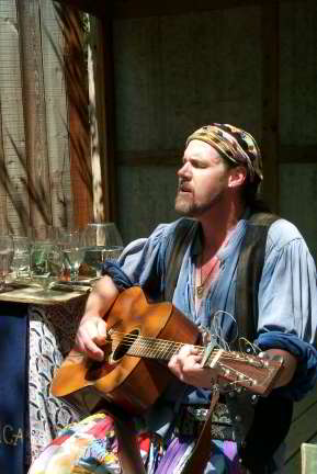 Donal Hinley - plays the guitar