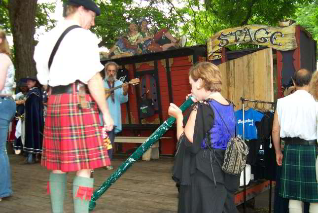 'Xan tries the instrument